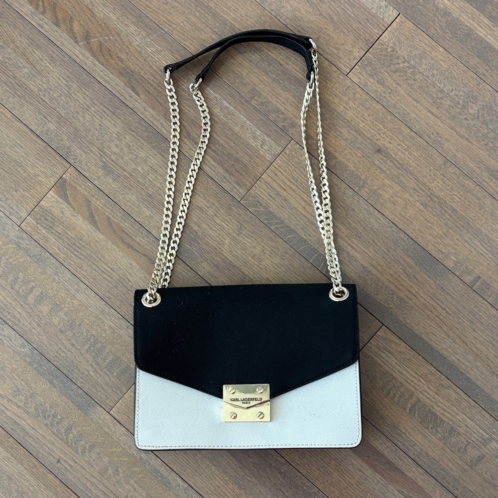 Karl Lagerfeld Paris black and white leather crossbody bag.